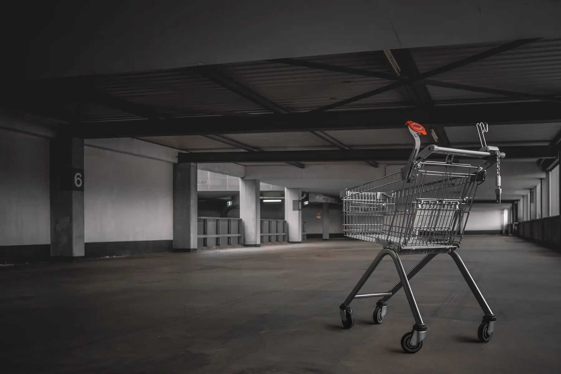 Shopify merchant reviewing checkout abandonment analytics on a laptop with funnel metrics showing add to cart and checkout starts but zero completed purchases